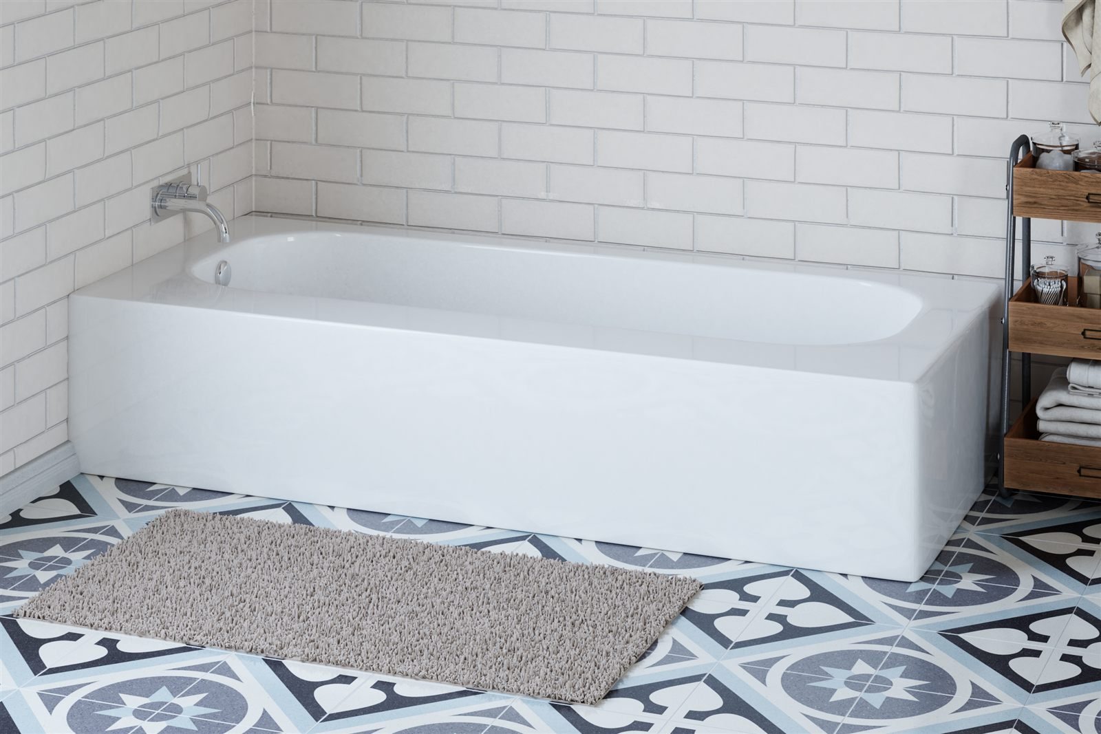 Before: a standard tub with a tall wall